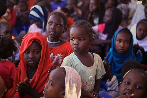 This photo released by The Norwegian Refugee Council (NRC) shows displaced children from el-Fasher at a camp where they sought refuge from fighting between government forces and the RSF, in Tawila, Darfur region, Sudan, Monday, Nov 3, 2025.
