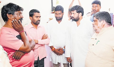 Transport Minister Ponnam Prabhakar and member of Rajya Sabha Anil Kumar Yadav visit families of Chevella road accident victims at Borabanda in Hyderabad on Tuesday.