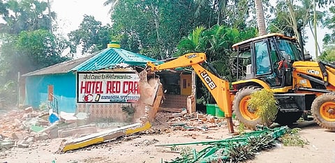 An illegal hotel being demolished near Bhitarkanika National Park on Tuesday