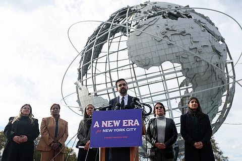New York City mayor-elect Zohran Mamdani, center, speaks in front of the Unisphere alongside his transition team, from left, Elana Leopold, Melanie Hartzog, Maria Torres-Springer, Grace Bonilla, and Lina Khan, in the Queens borough of New York, Wednesday, Nov. 5, 2025. 