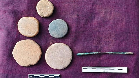Ancient artefacts, including an anjanakol and circular terracotta discs, were discovered near Panruti