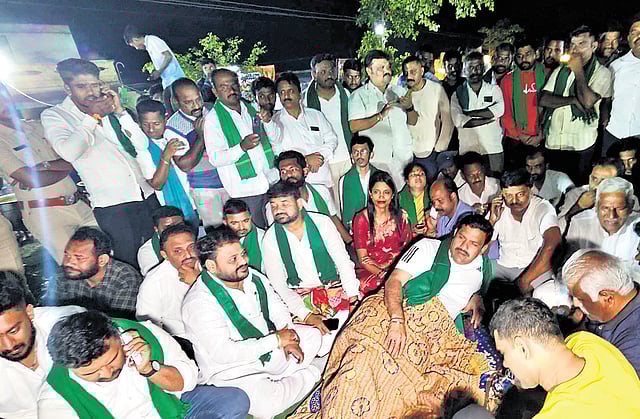 State BJP president BY Vijayendra sleeps at the venue on Tuesday night.