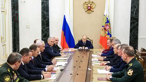 Russian President Vladimir Putin chairs a meeting with members of the Security Council in Moscow, Russia, Wednesday, Nov. 5, 2025. 
