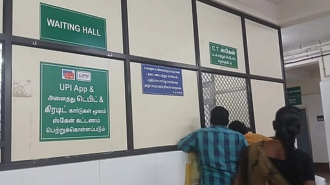 People waiting at the payment counter in the scan centre at MGMGH 