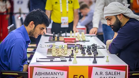 Abhimanyu Mishra (L) in action on Wednesday