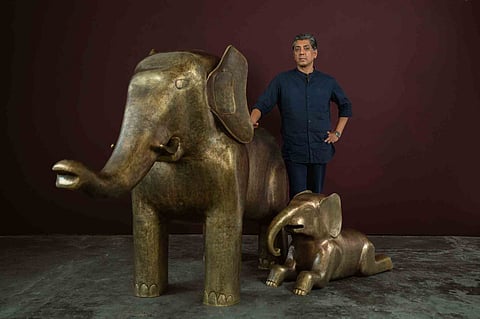 Vikram Goyal with his sculptures