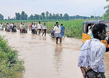 Pathapalem village tank breached, villages were inundated on Thursday.