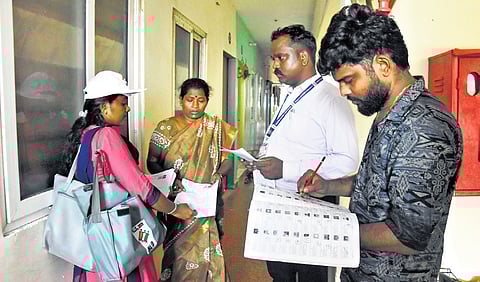 Election Commission officials carry out door-to-door verification as part of SIR at Egmore on Friday