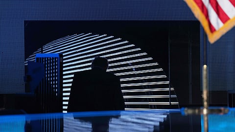 US President Donald Trump departs after speaking to the America Business Forum Miami at the Kaseya Center, in Miami, Nov. 5, 2025.