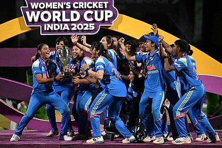 players celebrate with the trophy after winning the ICC Women's Cricket World Cup 2025