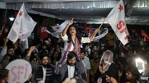 
Winning candidates in the JNUSU polls Aditi Mishra ( President, SFI) celebrate after the results on campus in New Delhi on Thursday.
