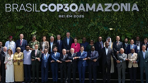 Leaders attending the COP30 UN Climate Summit pose for a group photo in Belem, Brazil, Friday, Nov. 7, 2025.