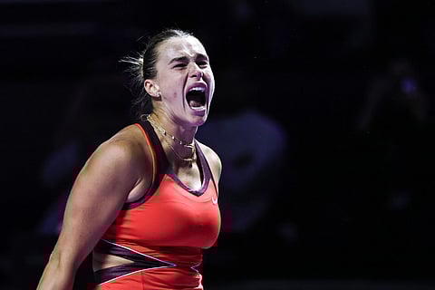 Belarus' Aryna Sabalenka reacts after playing a point against USA’s Amanda Anisimova during their semi-final tennis match at the WTA Finals in Riyadh on November 7, 2025.