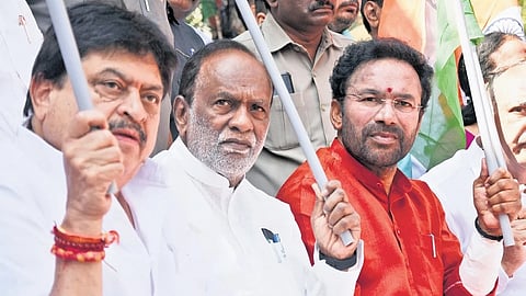 BJP state chief N Ramchander Rao, MP K Laxman and Union Minister G Kishan Reddy during the 150th anniversary celebrations of the national song Vande Mataram 
at Sultan Bazar in Hyderabad on Friday | SRI LOGANATHAN VELMURUGAN