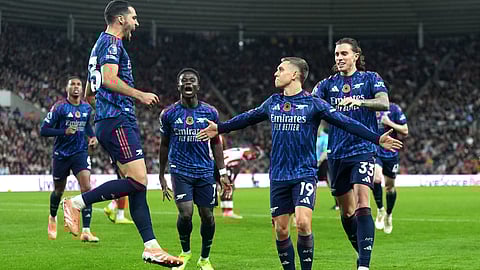 Arsenal's Leandro Trossard (centre) celebrates scoring their side's second goal of the game with team-mates during the EPL soccer match between Arsenal and Sunderland, in Sunderland, England, Saturday Nov. 8, 2025.