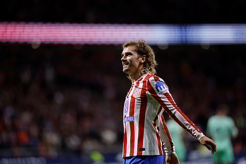 Atletico Madrid's Antoine Griezmann celebrates scoring his team's third goal during the Spanish league football match between Club Atletico de Madrid and Levante UD at Metropolitano Stadium in Madrid on November 8, 2025.