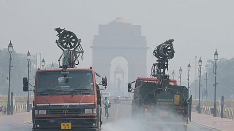 Anti-smog gun spraying water to curb air pollution at Kartavya Path, as the Air Quality Index (AQI) remains in the hazardous category, in New Delhi on Saturday. 