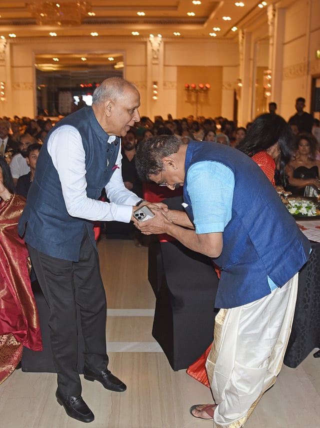 Radhakrishna Adiga, founder,  Brahmins’ Coffee Bar, greets TNIE CMD Manoj Kumar Sonthalia 