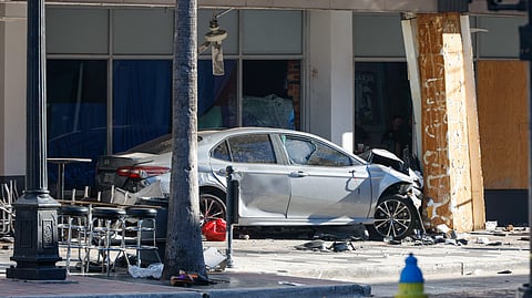 A car that crashed into a local business is shown on Saturday, Nov. 8, 2025, in Tampa, Fla.