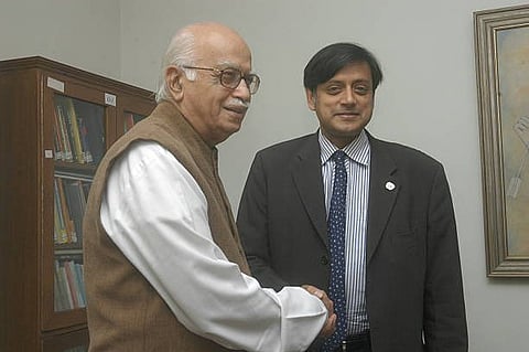 Congress MP Shashi Tharoor with BJP leader L K Advani. 