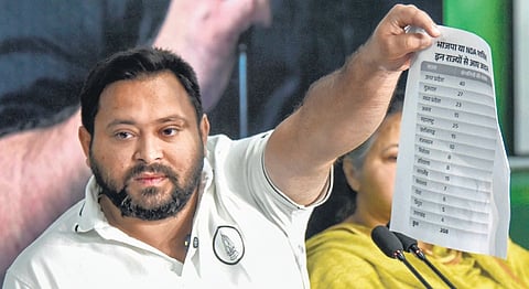 Tejashwi, EC in war of words over data