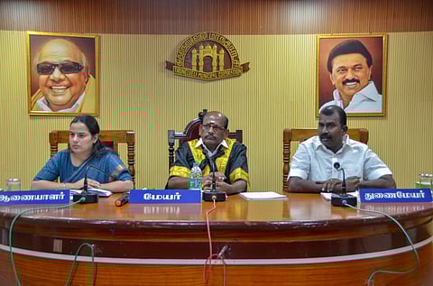 Mayor G Ramakrishnan, officials at the corporation meeting 