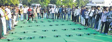 Election officials and Hanuma Vyuh Private Limited representatives display drones to be deployed during the Jubilee Hills byelection, at the Kotla Vijaya Bhaskar Reddy Stadium at Yousufguda on Monday.