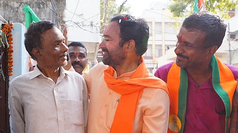Union Minister G Kishan Reddy takes part in a door-to-door campaign ahead of the Jubilee Hills byelection at Borabanda in Hyderabad.