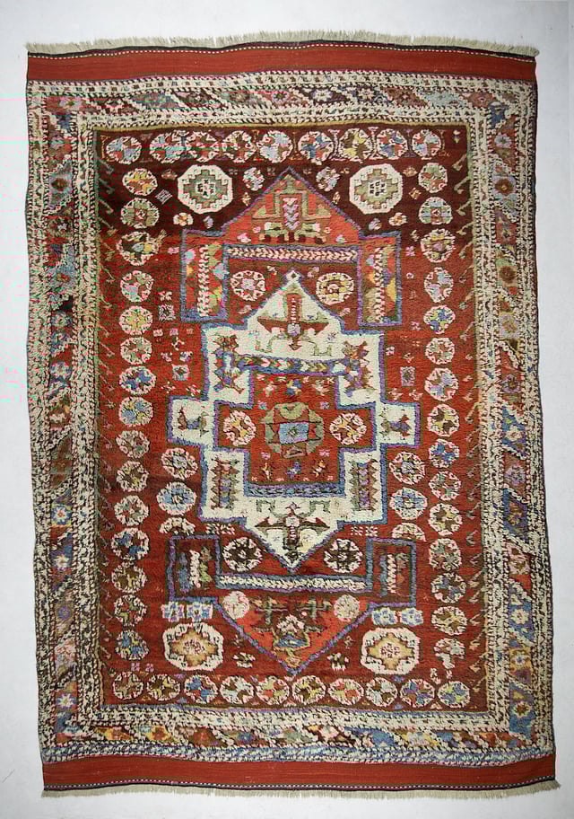 Carpet depicting an eight-pointed star