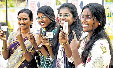 Beaming women voters show their ink-marked fingers after exercising their franchise at Erragadda on Tuesday.