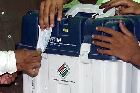 RJD leader Tejashwi Yadav flashes victory sign during a press conference after the conclusion of the Bihar Assembly election, in Patna, Wednesday, Nov. 12, 2025. 