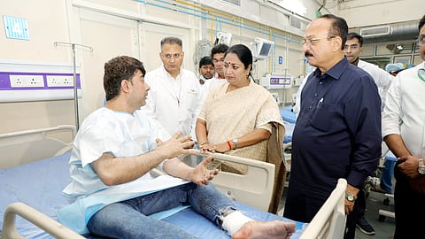 In this image received on Nov. 10, 2025, Delhi CM Rekha Gupta and Delhi Minister Ashish Sood meet an injured at Lok Nayak Hospital after the blast that occurred near Red Fort Metro Station on Monday, killing at least nine people and gutting several vehicles.