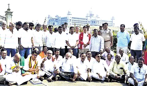 Activists stage a dharna in front of Suvarna Vidhana Soudha in Belagavi on Tuesday.