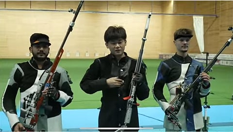 (from left) Aishwary Pratap Singh Tomar, Liu Yukun of China and Romain Aufrere of France 