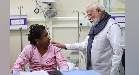 PM Modi meets those injured in the Red Fort blast at the LNJP Hospital in Delhi on Wednesday, Nov 12, 2025. 