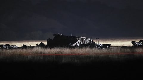 Debris is seen at a crash site of a Turkish military cargo plane in Georgia's Sighnaghi municipality, close to the Azerbaijani border on Wednesday, Nov. 12, 2025.