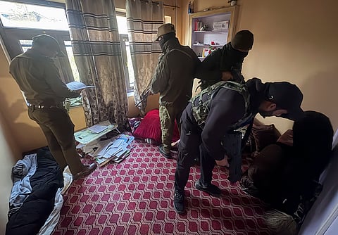  Security personnel during a crackdown against the banned organisation Jamaat-e-Islami (JeI), in Kulgam, Jammu and Kashmir, Wednesday, Nov. 12, 2025.