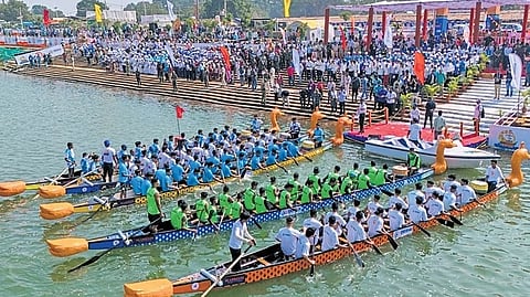 Participants at the boat race, in Mahanadi river on Tuesday.