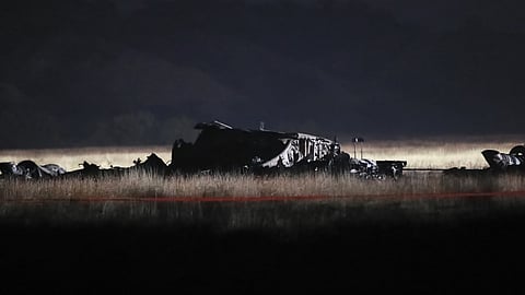 Debris is seen at a crash site of a Turkish military cargo plane in Georgia's Sighnaghi municipality, close to the Azerbaijani border on Wednesday, Nov. 12, 2025.