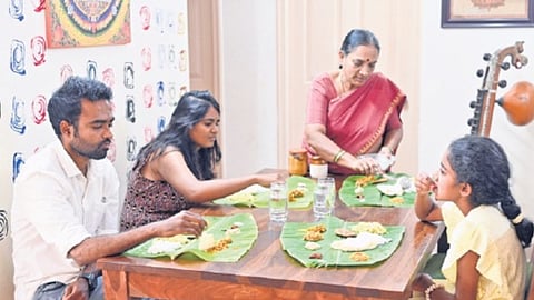 A family enjoying yele oota