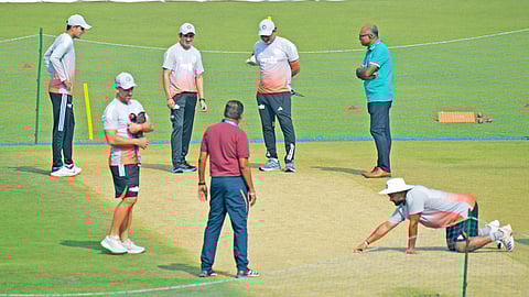 India head coach Gautam Gambhir, captain Shubman Gill (left), Rishabh Pant (kneeling) check the pitch at Eden Gardens in Kolkata on Thursday