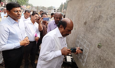 Minister EV Velu inspects the ongoing flyover works in Goripalayam in Madurai.
