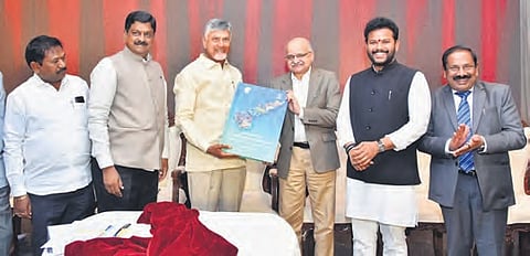 Chief Minister Nara Chandrababu Naidu unveiling a report on the Visakhapatnam Economic Region (VER) at a meeting in Visakhapatnam on Thursday.