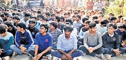 Students of RGUKT stage a dharna in Srikakulam district on Thursday.