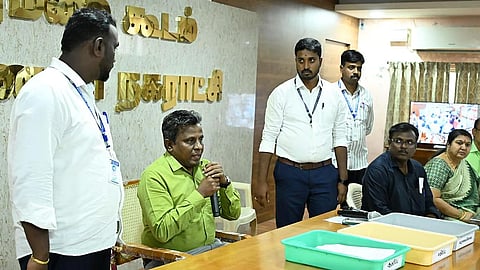 Municipal Commissioner B. Sathish Kumar announcing the results of the no-confidence motion in Krishnagiri municipality on Monday.