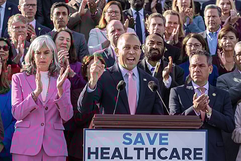 House Minority Leader Hakeem Jeffries, D-N.Y., and fellow Democrats speak about the health care fight on the steps of the House before votes to end the government shutdown, at the Capitol in Washington.