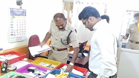 Police personnel conducting a raid at a recruitment agency at Kochi