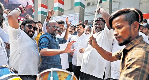 Congress activists celebrate the victory of party candidate V Naveen Yadav in the Jubilee Hills bypoll, at the Gandhi Bhavan in Hyderabad on Friday.