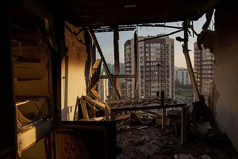 An apartment is seen damaged after a Russian attack on residential neighbourhood in Kyiv, Ukraine, on Friday, Nov. 14, 2025.