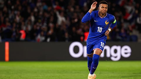 France's Kylian Mbappe celebrates after scoring his team 's first goal during the 2026 World Cup qualifiers Europe zone group D football match between France and Ukraine at the Parc des Princes stadium in Paris, on November 13, 2025. 